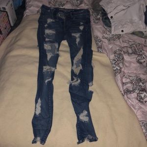 Ripped Dark Blue Jeans